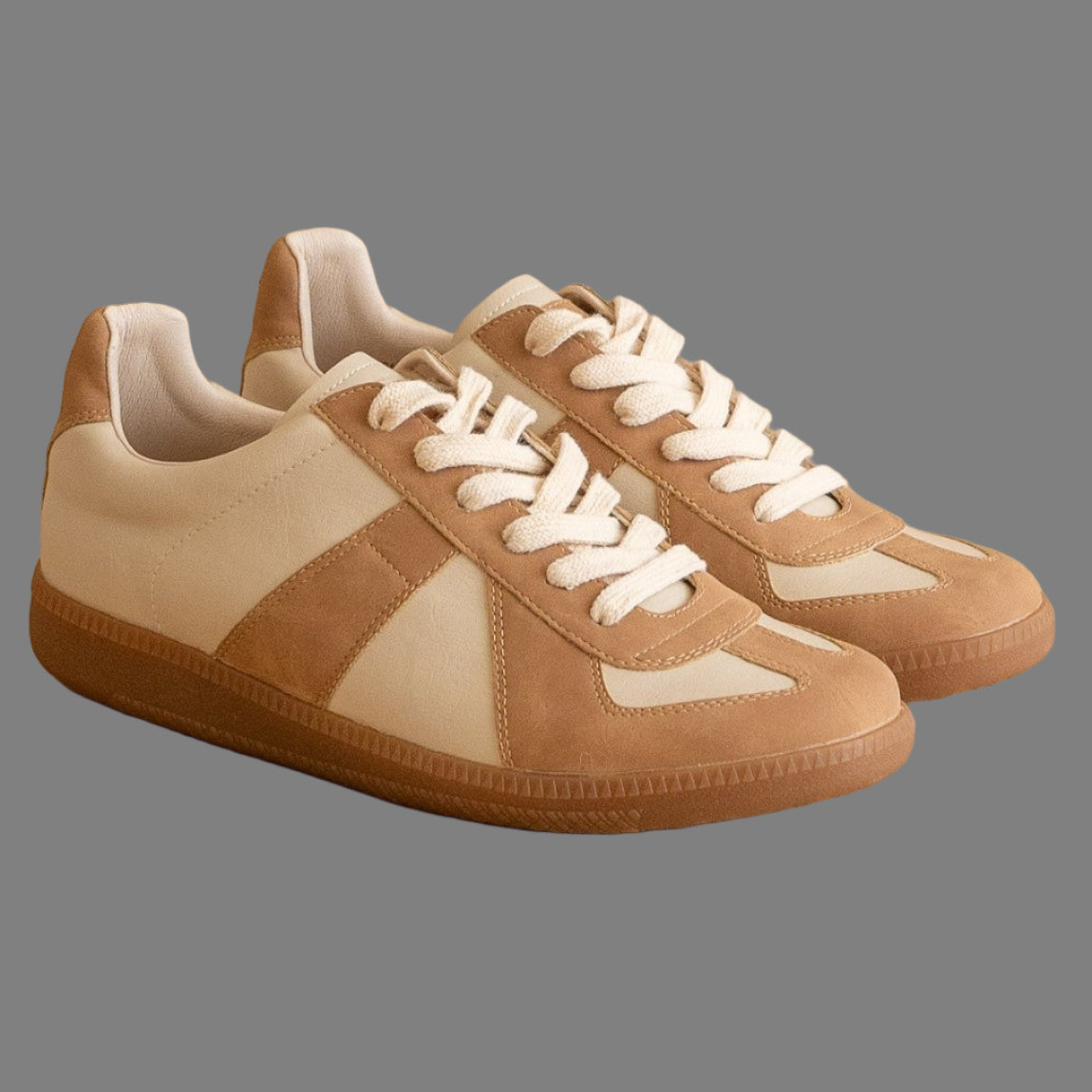 “Ollie Low Top Sneakers in vegan leather with cushioned insole and rubber sole”