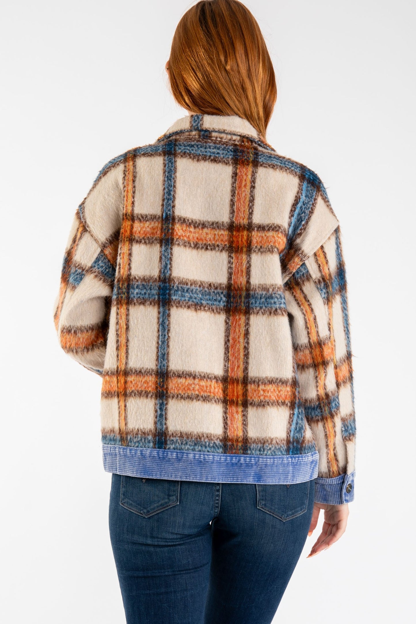 Woman wearing Brooks Plaid Fleece Jacket with plaid print and corduroy collar