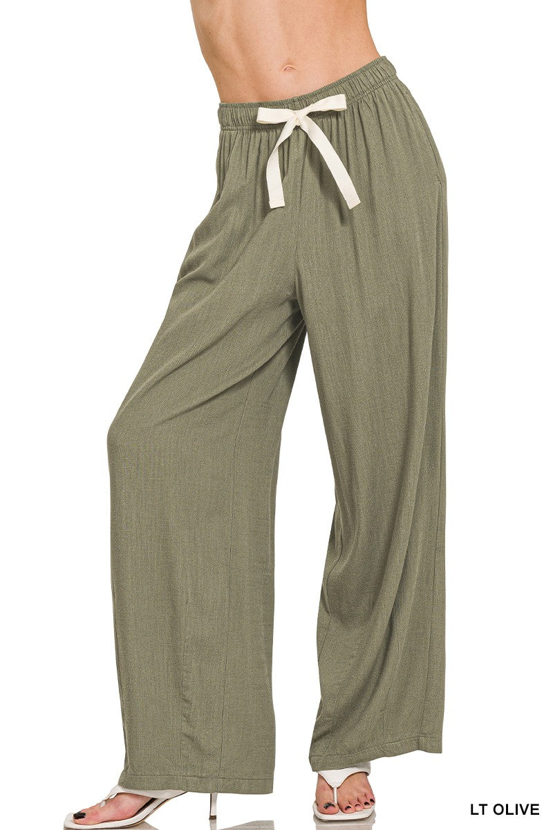 Cathy Linen Drawstring Pants with elastic waistband, 30-inch inseam
Women’s relaxed fit linen-blend pants with pockets – Hidden Jewell Boutique
Linen drawstring trousers styled with Cleo Linen Vest