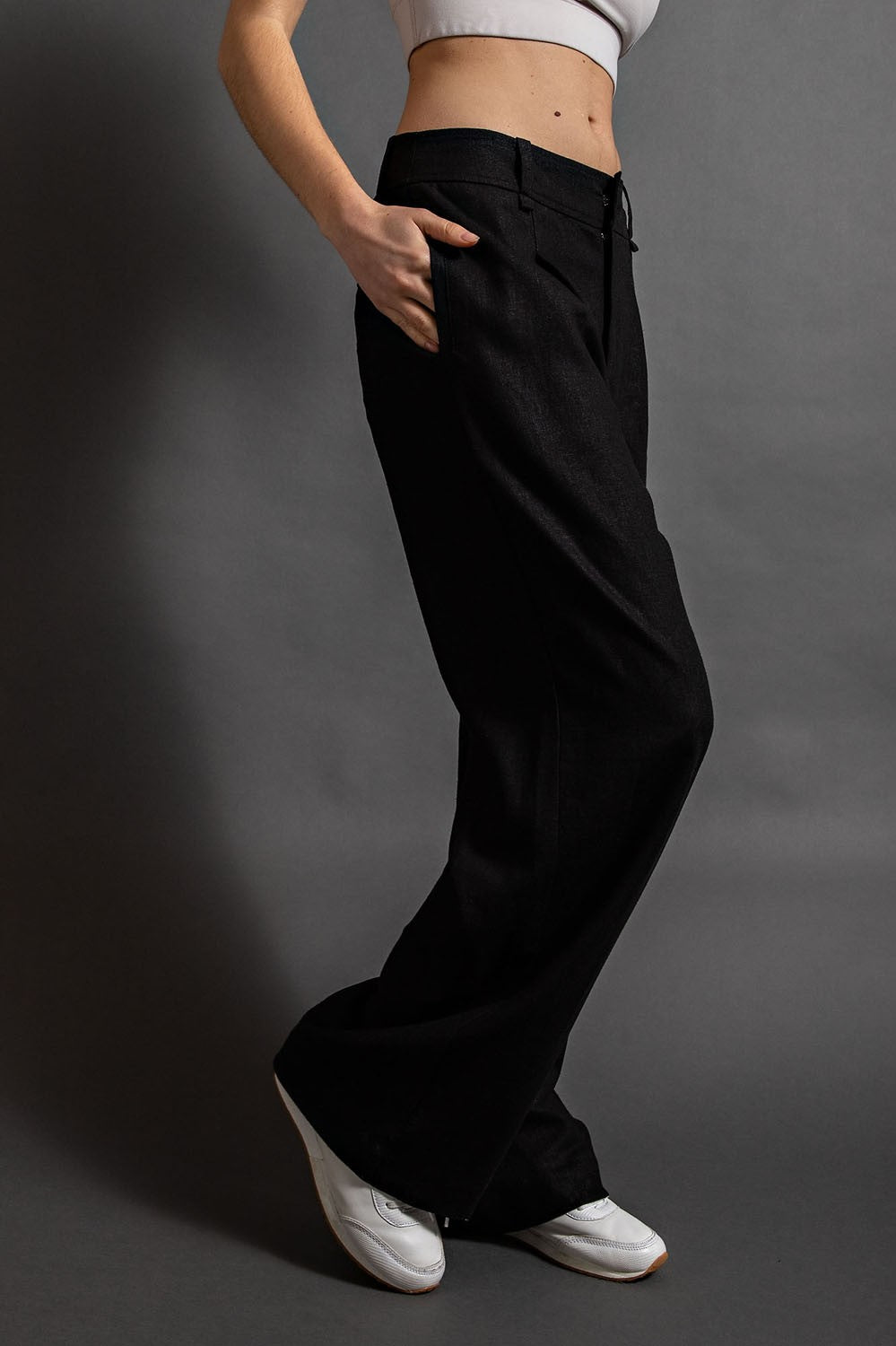 Model wearing McCall Linen Wide Leg Pleated Pants with pintuck and side pockets