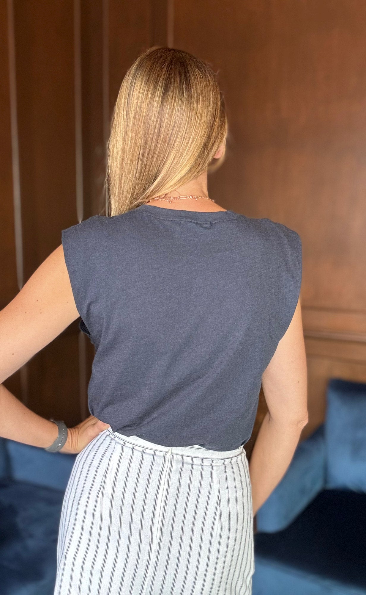 Navy Winry bodysuit styled with skirt