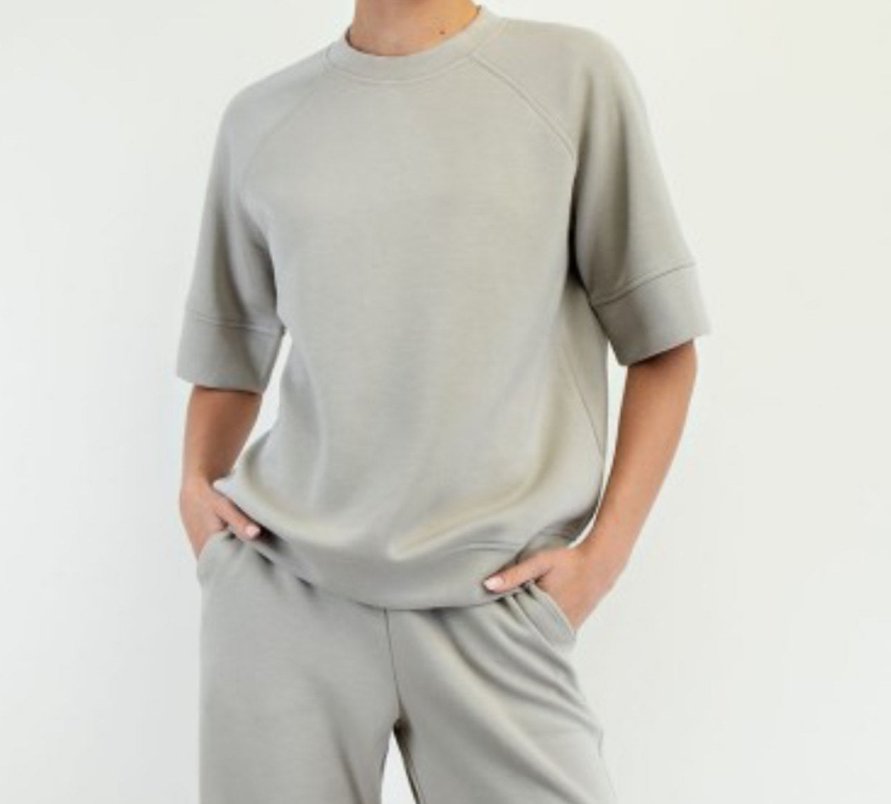 Model wearing Reva Modal Scuba Sweatshirt with oversized 3/4 sleeves and relaxed fit