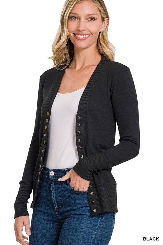 Black snap button cardigan with ribbed detail on sleeves and hem

