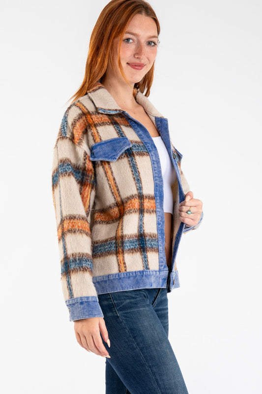 Woman wearing Brooks Plaid Fleece Jacket with plaid print and corduroy collar