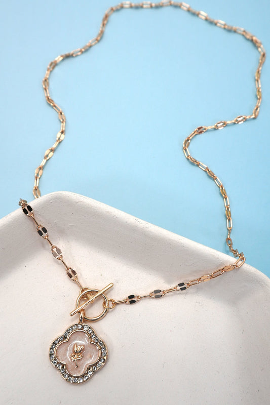 Gold-plated rhinestone rose and pearl charm toggle necklace on paperclip chain

