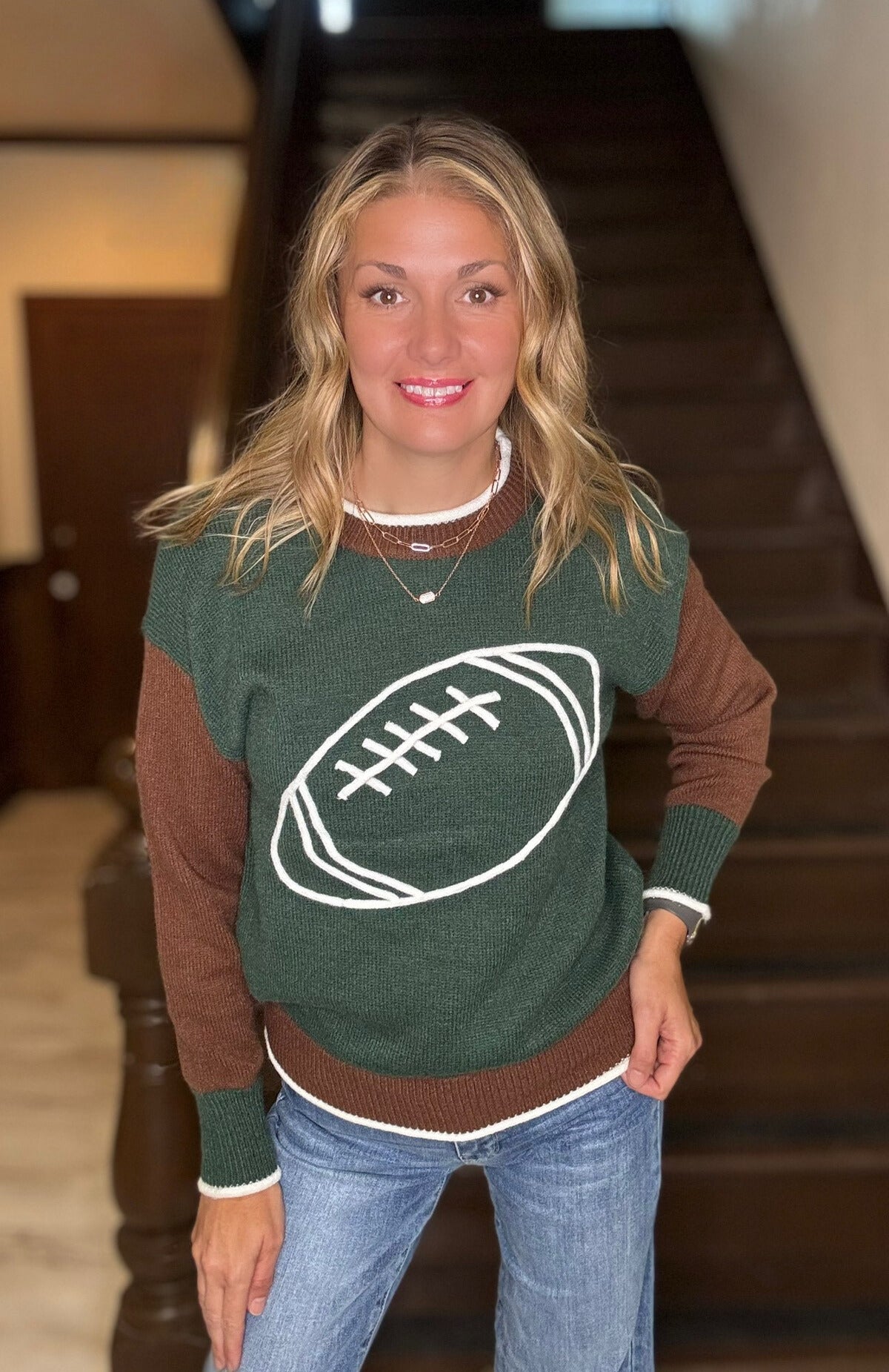  Larissa football colorblock sweater with contrast sleeves and front football detail


